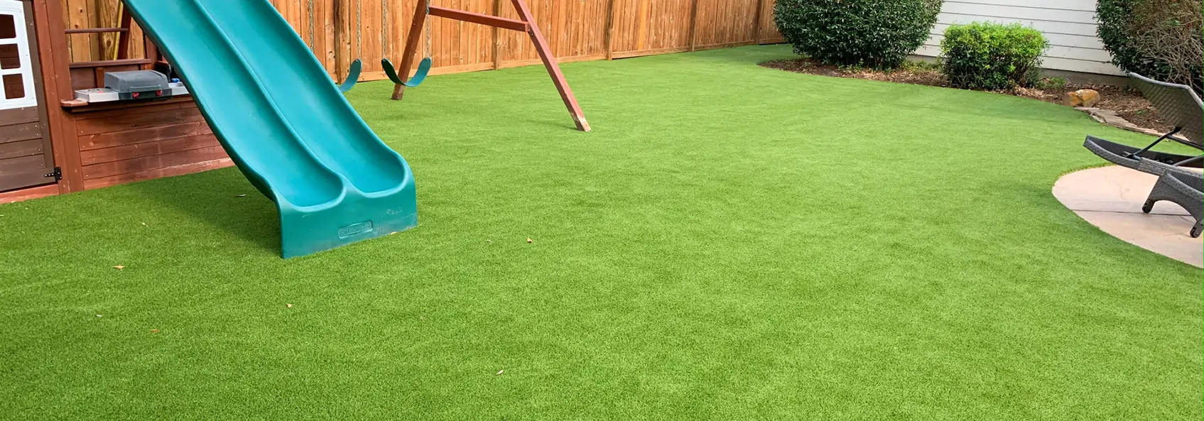 Residential playground with SYNLawn artificial grass