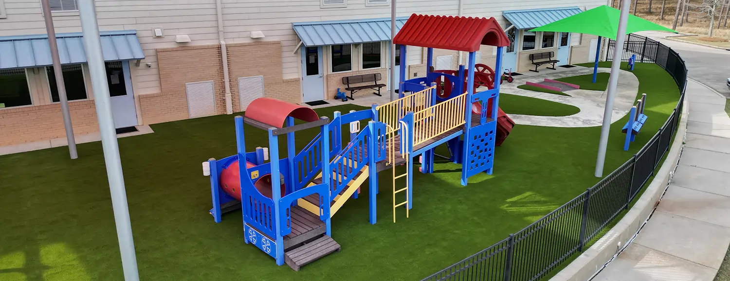 Commercial artificial grass playground installation from SYNLawn