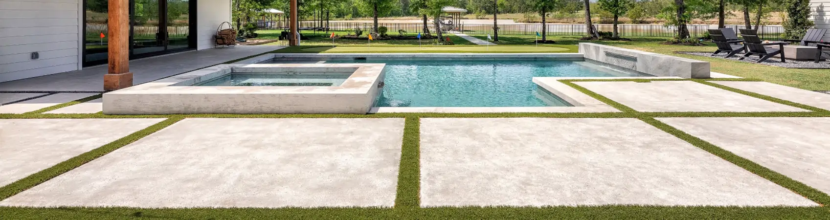 Pool deck with SYNLawn artificial grass installed